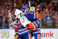 Corey Perry #90 hugs Stuart Skinner #74 of the Edmonton Oilers after Game Four of the Western Conference Final of the 2024 Stanley Cup Playoffs against the Dallas Stars.