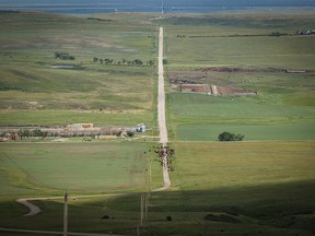 Moving cattle down the road to pasture in the Oxley Creek valley west of Stavely, Ab., on Tuesday, June 18, 2024.