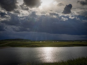 Storm clouds over Pine Coulee Reservoir west of Stavely, Ab., on Tuesday, June 18, 2024.