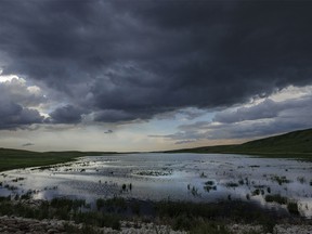 Storm clouds over Pine Coulee Reservoir west of Stavely, Ab., on Tuesday, June 18, 2024.
