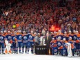 Edmonton Oilers stand beside the Campbell Bowl after defeating the Dallas Stars 2-1 at Rogers Place in Edmonton on June 2, 2024.