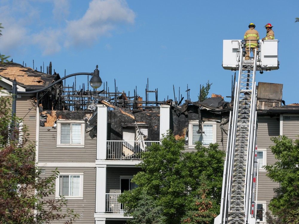 Dozens evacuated as blaze tears through McKenzie Towne condo building ...