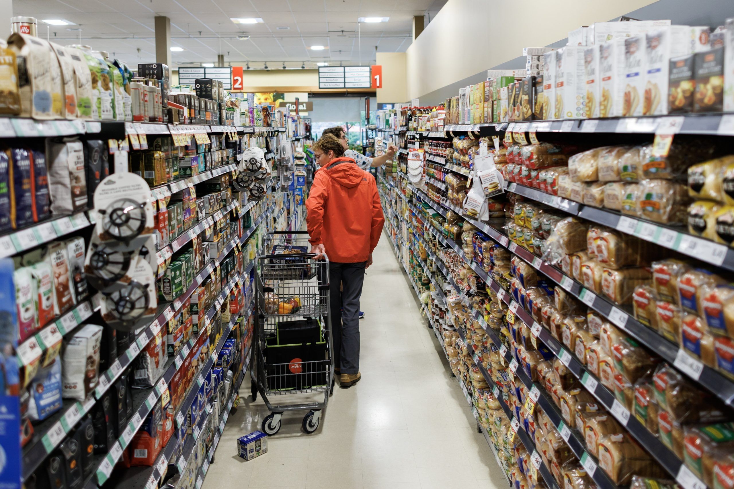 People shop inside a Metro grocery store in Toronto, Tuesday, July 18, 2023.