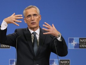 NATO Secretary General Jens Stoltenberg addresses a media conference after a meeting of NATO defense ministers at NATO headquarters in Brussels, Friday, June 14, 2024.