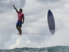 Brazil's Gabriel Medina reacts after getting a large wave in the 5th heat of the men's surfing round 3, during the Paris 2024 Olympic Games.