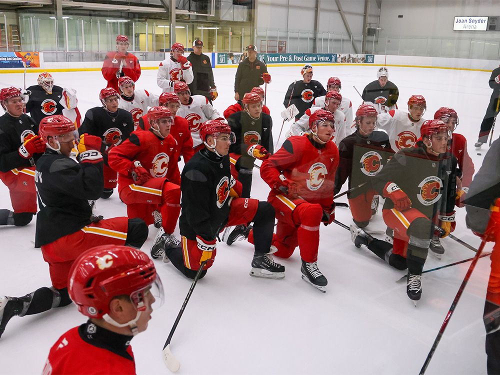 How do the Flames deliver the bad news to their training camp cuts