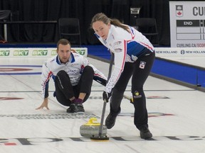 Rachel Homan and playing partner Brendan Bottcher take part in a practice session on Dec. 29, 2024, before the Canadian mixed doubles curling trials.