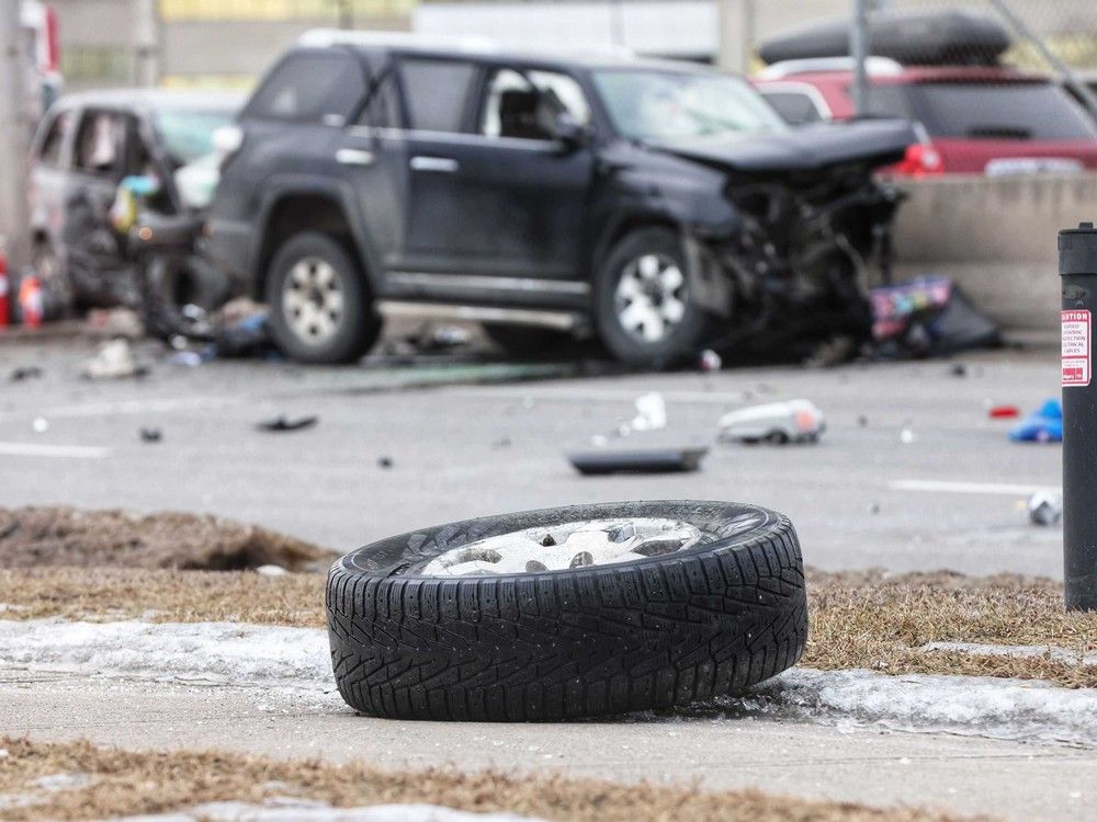  first responders work at the scene of a fatal multi-vehicle collision on macleod trail at southland drive in calgary on thursday, dec. 26, 2024.