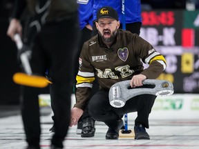 Manitoba skip Reid Carruthers calls out to the sweepers while playing Alberta-Koe during the Brier.