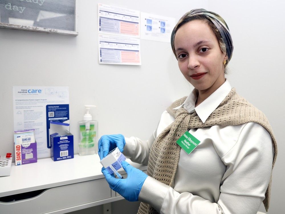  pharmacy manager heba (heather) elbayoumi from heathers pharmacy and travel clinic in kensington with the meal vaccines in calgary on friday, april 4, 2025. darren makowichuk/postmedia