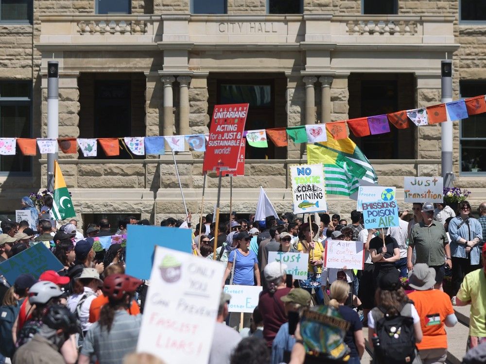 Ahead of G7 summit, protesters gather at city hall to 'raise voices' | Calgary HeraldUser