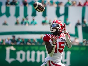 Calgary Stampeders receiver Dominique Rhymes (15) makes a catch during the first half of CFL football action against the Saskatchewan Roughriders