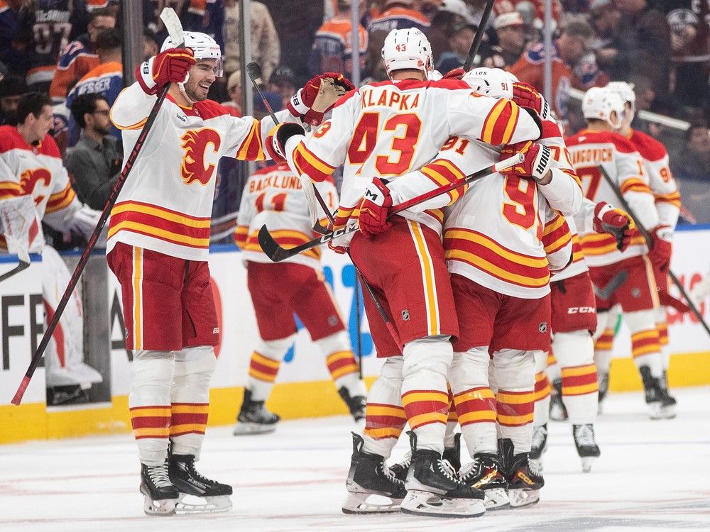 The Flames climbed out of a 3-0 hole and then, after eight shootout rounds, left Edmonton with two points on opening night.