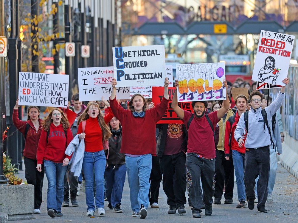 Western Canada High School students rally at City Hall after leaving class on Thursday, October 30, 2025. Students were protesting the provincial government's decision to force striking teachers back to work using legislation and a non-compliance clause.
