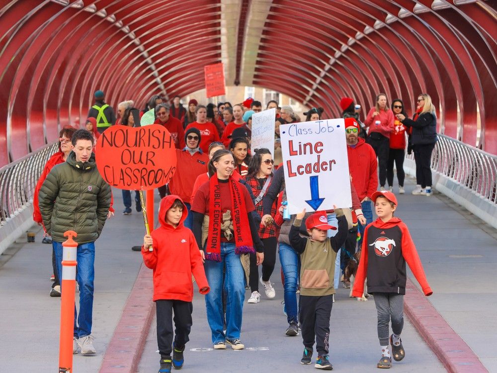About 1,000 teachers and their supporters marched in Calgary as the provincial teachers' strike continued on October 24, 2025. The provincial government is threatening to revisit labor laws on Monday.