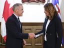 Prime Minister Mark Carney meets with Alberta Premier Danielle Smith in Calgary on Thursday.