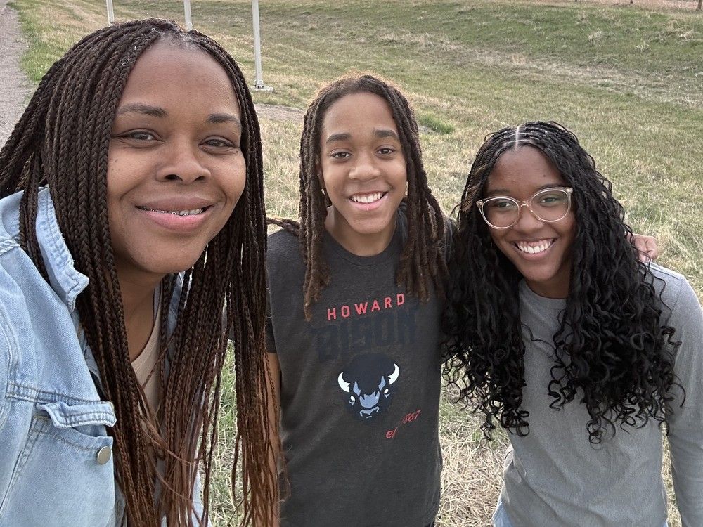  (L-R) Pamela Smith, her son, Reginald Smith III and daughter Rachel Smith. The family is looking to make Canada (possibly Calgary) their home and move from the United States north to Canada.