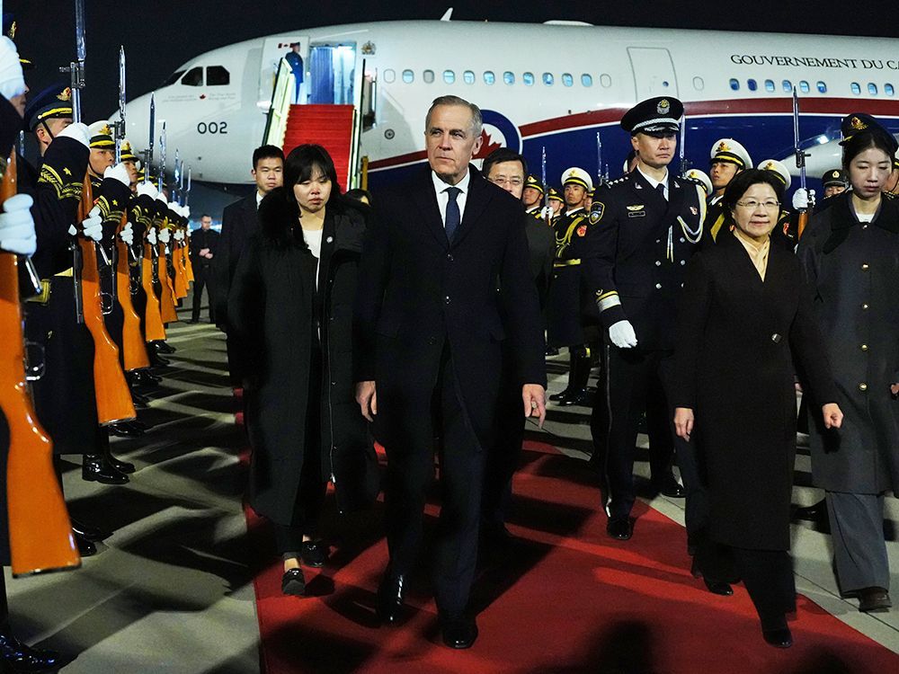 Prime Minister Mark Carney arrives in Beijing, China, on Wednesday, Jan. 14, 2026.