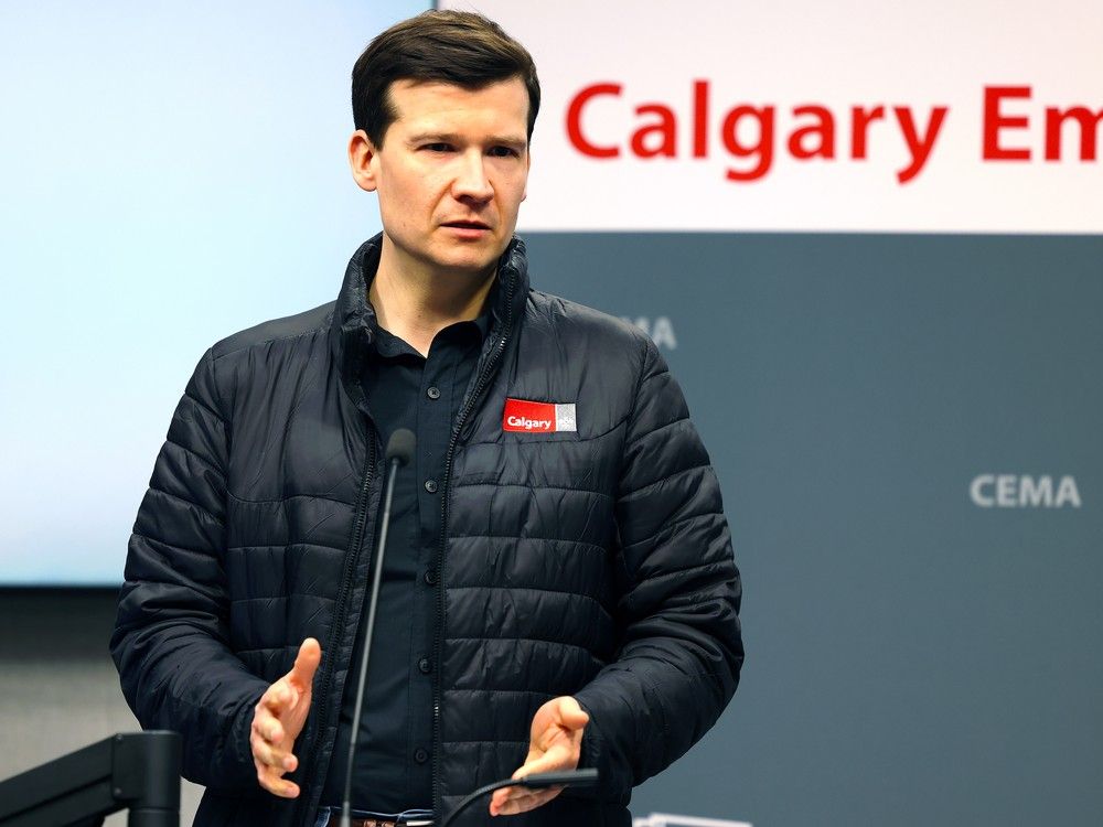  Calgary Mayor Jeromy Farkas speaks at a press conference held at the Emergency Operations Centre, where he gave an update on the Bearspaw South feeder main break on Monday, Jan. 12, 2026.