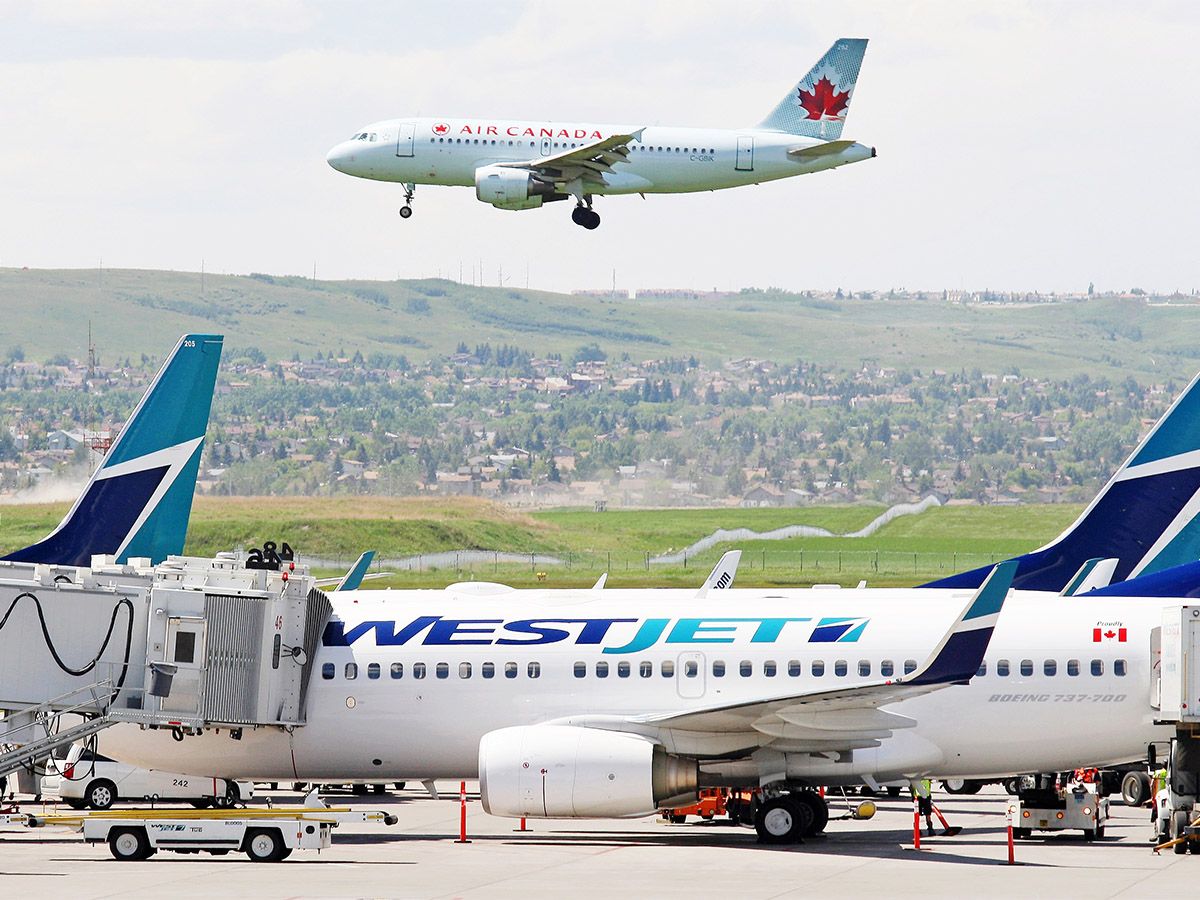 Canadians may pay hundreds more for summer vacation flights, despite falling oil prices
