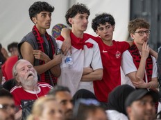 Canadian fans watch the game at a watch party in Edmonton after Switzerland scored during a FIFA World Cup game in Vancouver on Wednesday, June 24, 2026.