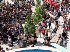 Members of the Flying Fools High Dive team perform at the Stampede in Calgary on Tuesday, July 7, 2026.