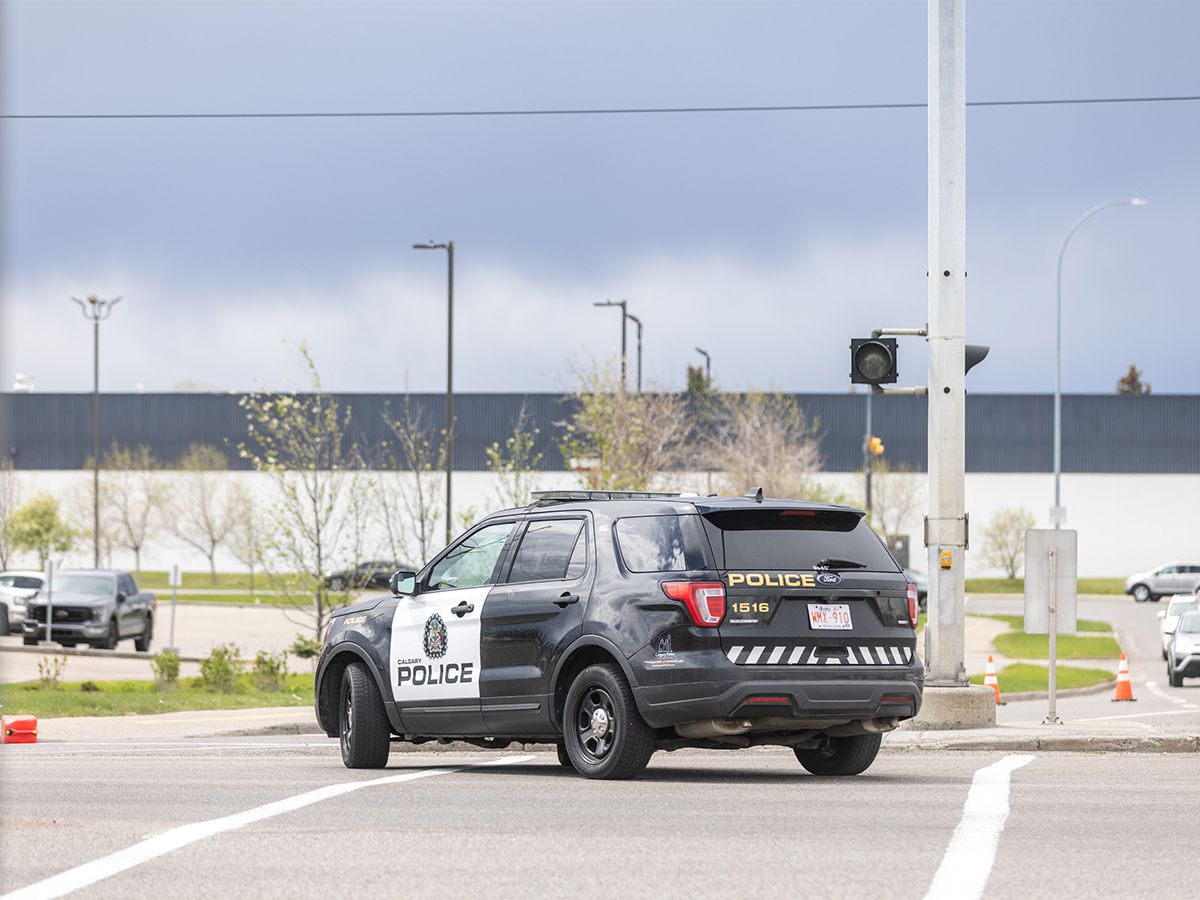 Police work at the scene of a collision involving a pedestrian at 23rd Avenue and Barlow Trail S.E. in Calgary on Wednesday, May 20, 2026.