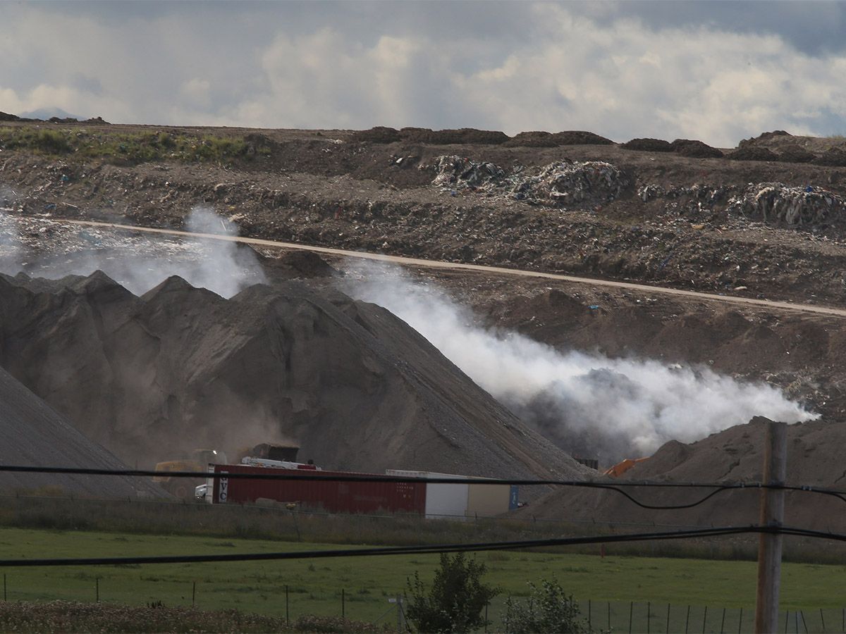 The province says concerns about suspected non-compliance at a Calgary landfill have prompted a review of waste storage regulations.
