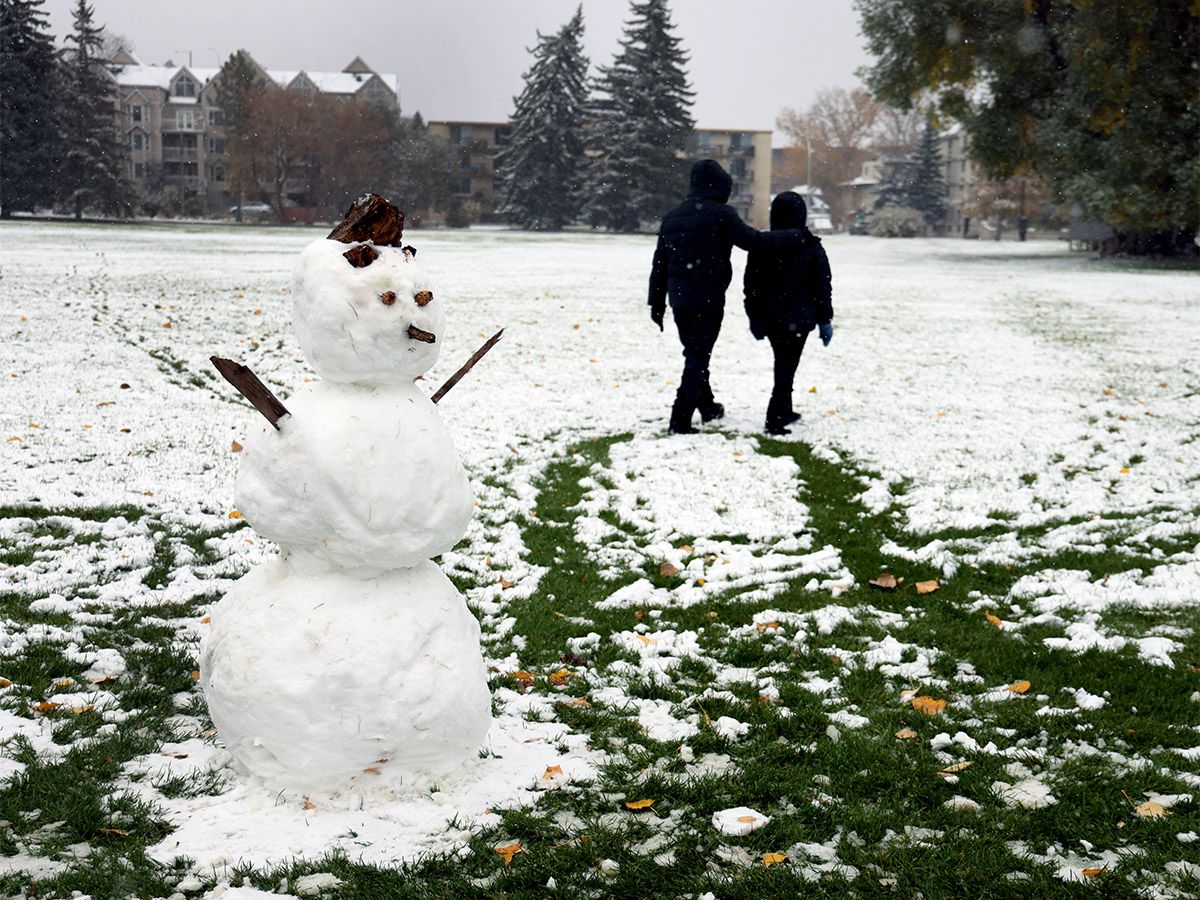 Calgarians woke up to the first dump of snow with flurries throughout the day in Calgary on Sunday, Oct. 11, 2026.