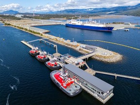 An LNG carrier and tugboats at the LNG Canada shipping terminal in Kitimat, B.C. in 2026.