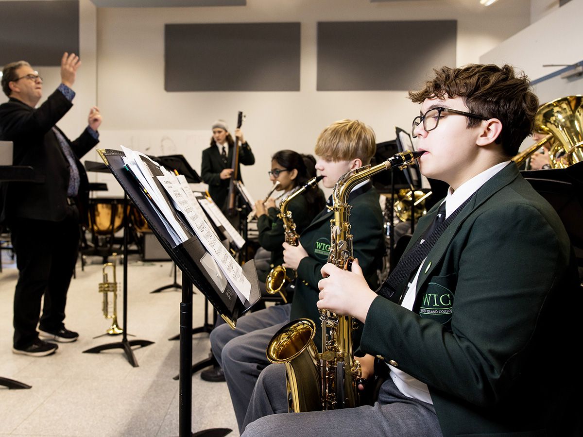 West Island College band director Jay Michalak leads students. SUPPLIED