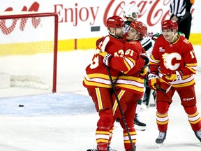 Calgary Flames Aydar Suniev scores on Minnesota Wild goalie Jesper Wallstedt in first period NHL action at the Scotiabank Saddledome