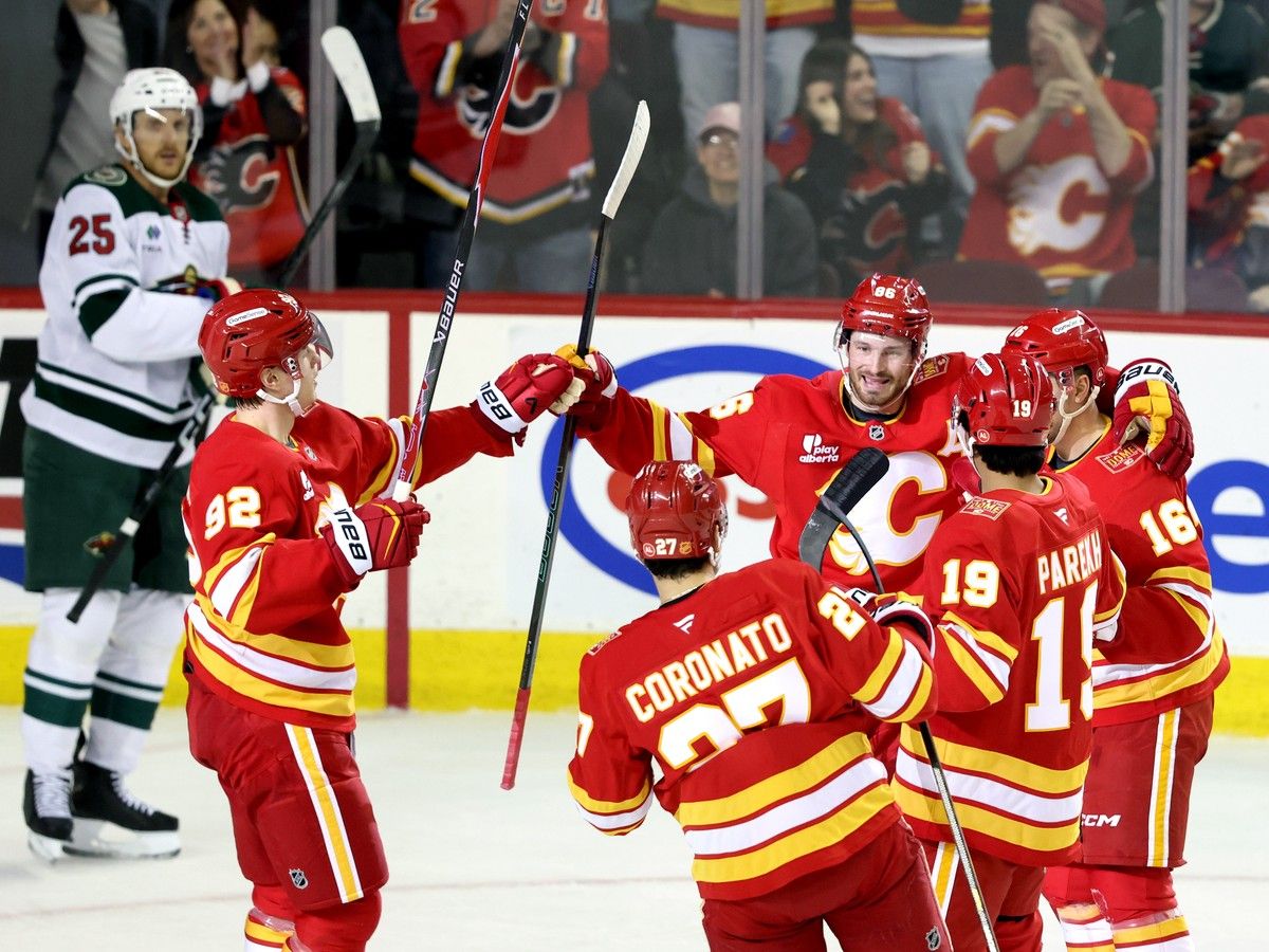 Calgary Flames Joel Farabee scores on Minnesota Wild goalie Jesper Wallstedt in first period NHL action at the Scotiabank Saddledome