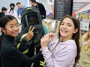 Students wearing a flash suit