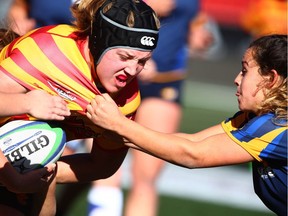 Kasselle Menin (left) of the Calgary Dinos.
Jim Wells, Jim Wells/Postmedia