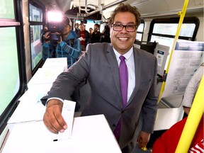 Naheed Nenshi casts his ballot at an advance voting station on Tuesday.