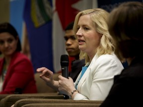 Sara Austin, founder and CEO of Children First Canada, speaks during Children First Canada's 'The Kids are Not Alright' panel discussion at the Westin hotel in downtown Calgary, Alta., on Wednesday, April 5, 2017. Lyle Aspinall/Postmedia Network