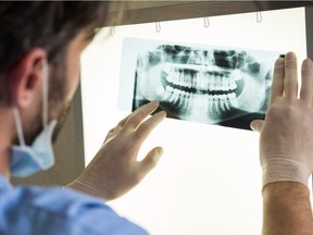 Dental x-ray

Closeup of dentist looking at dental x-ray plate

Model and Property Released (MR&PR)
Ridofranz, Getty Images/iStockphoto