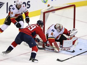 Calgary Flames v Washington Capitals

WASHINGTON, DC - NOVEMBER 20: Goalie Mike Smith #41 of the Calgary Flames makes a save on Alex Chiasson #39 of the Washington Capitals during the first period at Capital One Arena on November 20, 2017 in Washington, DC. (Photo by Patrick Smith/Getty Images)
Patrick Smith, Getty Images