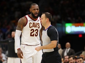 LeBron James #23 of the Cleveland Cavaliers argues after being ejected in the second half by referee Kane Fitzgerald #5 while playing the Miami Heat at Quicken Loans Arena on November 28, 2017 in Cleveland, Ohio. Cleveland won the game 108-97. (Photo by Gregory Shamus/Getty Images)