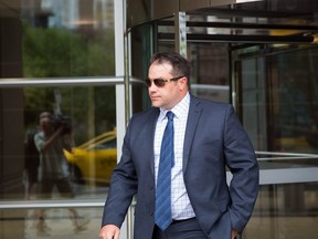James Othen walks out of the Calgary Courts Centre on Aug. 21 2017.