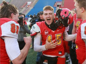 U of C Dinos kicker Niko Difonte celebrates after his 59 yard field goal in the final seconds cinched the game over the UBC Thunderbirds 44-43. Gavin Young/Postmedia

Postmedia Calgary
Gavin Young, Postmedia