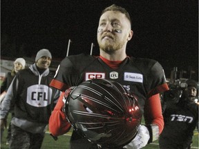 Stamps QB Bo Levil Mitchell runs off the field after winning the CFL Western Final in Calgary between the Calgary Stampeders and the Edmonton Eskimos on Sunday, November 19, 2017. Jim Wells/Postmedia

Postmedia Calgary
Jim Wells/Postmedia