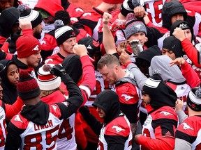 Calgary Stampeders' Bo Levi Mitchell, centre, joins his team as they take part in the Grey Cup west division champions practice in Ottawa on Saturday, Nov. 25, 2017.