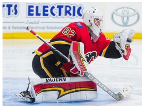 Calgary Flames goalie Tyler Parsons makes a glove save against the Edmonton Oilers during the NHL Young Stars Classic hockey action at the South Okanagan Events Centre in Penticton, B.C., September, 8, 2017.
