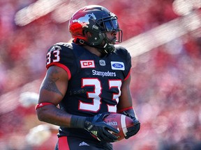 Stampeders Jerome Messam rumbles his way into the end zone against the Edmonton Eskimos on Monday, Sept. 4, 2017.