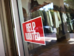 MIAMI, FL - SEPTEMBER 04: A help wanted sign is seen in the window of the Unika store on September 4, 2015 in Miami, Florida. The U.S. Bureau of Labor Statistics released the August jobs report that shows that the economy created just 173,000 new jobs last month. But the unemployment rate dipped to 5.1%, the lowest since April 2008, (Photo by Joe Raedle/Getty Images)