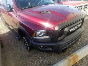 Dodge Ram truck Lethbridge police say was stolen from a local dealership and was ultimately stopped after running over an RCMP spike belt outside the southern Alberta city. It was one of several vehicles stolen during a destructive spree on Thursday, Nov. 30, 2017. Supplied photo