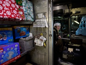 UPS driver Daria Matsevich is all set to deliver gifts to families on Saturday, Dec. 16.
