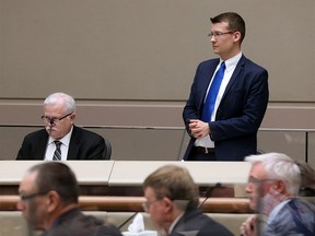 Ward 11 Councillor Jeromy Farkas stands to add his agenda item on the Midfield Mobile Home Park at the start of Monday's council session, December 18, 2017.  Gavin Young/Postmedia